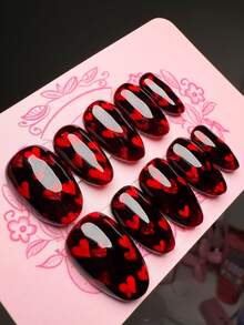 Bộ móng giả dài hình bầu dục màu đỏ 10 chiếc chủ đề Năm Mới và Giáng Sinh, màu đen lấp lánh phong cách Y2K ngọt ngào và quyến rũ dành cho các cô gái, được trang trí bằng hình trái tim đỏ, bộ móng giả có thể tháo rời hoàn toàn, thích hợp cho nhân viên văn phòng, học sinh, các cô gái dự tiệc và các dịp làm móng quanh năm, kèm theo 1 miếng thạch trái cây và 1 dũa móng. - Đỏ - Xem 3