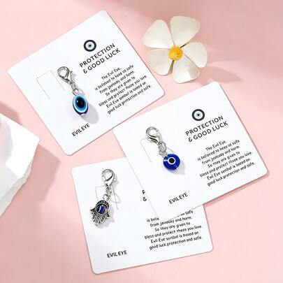 EBUDAE 1pc Alloy Evil Eye With Card, Weird Evil Eye Pendant, Decorative Keychain For Good Luck, Suitable For Back Pouch, Handbag, Money Pouch, Key Decoration, Eye-Catching Color And Unique Design Bring A Touch Of Weird And Mystical Charm, Ideal Gift For Friends