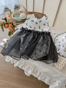 Bộ 2 món gồm áo liền quần và mũ in hình bướm dễ thương, viền ren lưới, dành cho bé gái. - Đen và trắng - Xem 1