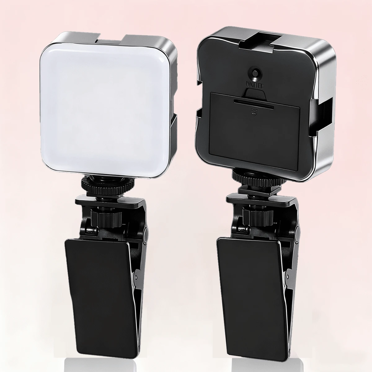 Luz de relleno LED con ajuste de temperatura de color dual, que permite cambiar libremente entre luz fría y cálida. Cuenta con rotación de 360 grados para ajustar el ángulo y un diseño con clip compatible con teléfonos móviles y ordenadores. Compacta y portátil, ideal para transmisiones en directo, maquillaje y selfies. Equipada con una batería integrada de alta capacidad para una mayor autonomía, proporciona una iluminación uniforme a través de eficientes fuentes de luz LED. - Negro - Ver 1