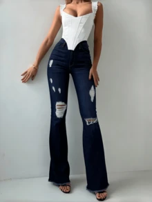 Pantalones acampanados, elegantes y contemporáneos, diseñados específicamente para mujeres. - Azul rasgado - Ver 1