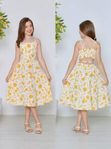 Girls' Midi Dress | Printed Midi Dress With Back Bow And Thin Straps | Girls' Teen Fashion Sizes 10, 12, 14, 16 |  And Delicate Style Girl's Dress | Lightweight And Comfortable Flared Midi Dress | Teen Girl's Dress For Parties, Outings, And Everyday Wear | Charming Girls' Clothing | Dress With Back Tie And Layered Skirt | Midi Dress For Pre-Teen And Teen Girls | Colorful Girls' Dress In Yellow, Orange, Green, And Blue | Elegant And Modern Teen Girl's Clothing | Dress For Birthdays, School Parties, Family Outings | Girls' Dress For Spring/Summer | Girl's Dress With A Loose Fit And Lightweight Fabric | Stylish Teen Girl's Look | Comfortable Midi Dress For Everyday Wear | Ideal Gift For Stylish Girls | Sophisticated And Cheerful Girls' Teen Fashion - 奶油黃 - 查看 1