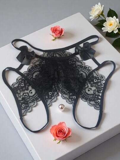 AB. Sexy Lace Hollow Out Bowknot Women's Panties, Transparent Open Crotch Lace Mid-Waist Thong, Delicate Sensual Style. Classic Mid-Waist Cut Fits Waistline, Gentle Wrap Around Abdomen Without Bulging. Triangular Cut Precisely Shapes Buttocks, Creating A Natural Peachy Butt. Extensive Lace Hollow Out Design, Subtly Outlines The Curves With A Hazy Sexy Atmosphere. Bowknot Decor On The Side, Sweet And Energetic, Balancing Sexiness And Girlishness