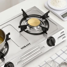 Placa de gas de doble quemador / Cuerpo de acero inoxidable, fabricada para durar y fácil de limpiar. Su eficiente diseño de combustión con llama concentrada proporciona un calor potente y uniforme, ideal tanto para saltear a alta temperatura como para cocinar a fuego lento. Cuenta con un dispositivo de integrado que se activa en caso de fallo de la llama, por lo que es la opción ideal para la cocina familiar. - Plateado - Ver 4