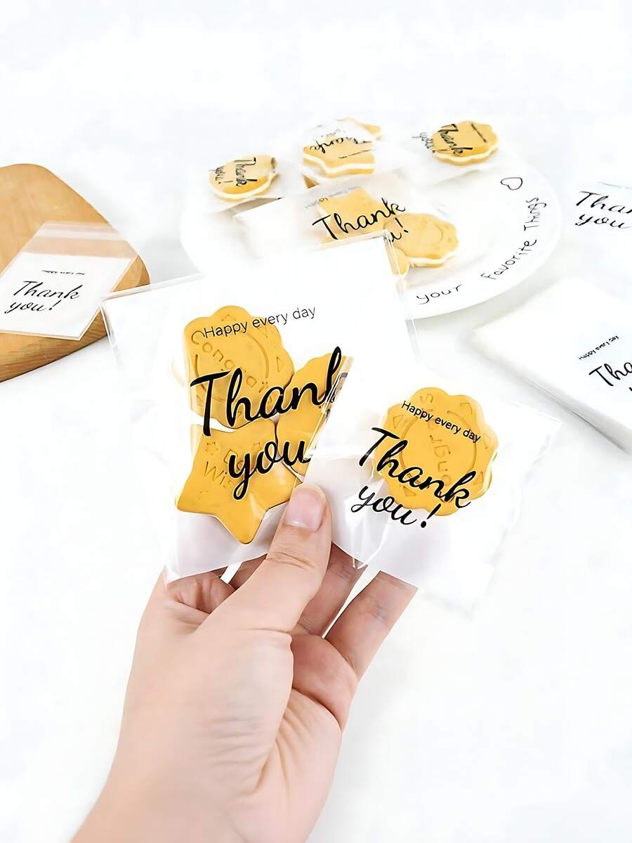 100pcs Transparent Self-Sealing Plastic Gift Bags With "Thank You" Design, Elegant Handwritten Style, Resealable, Suitable For Party, Accessory Packaging, And Gifting Baked Goods, Cookies, Chocolates, Etc. - Multicolor - View 1