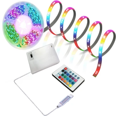 TK99SW 带电池盒电源的 LED 灯带（不含电池），配有 24 键遥控器、多种颜色模式和可调亮度、自粘背衬，适合户外便携使用或电视、电脑、节日的室内/室外装饰照明