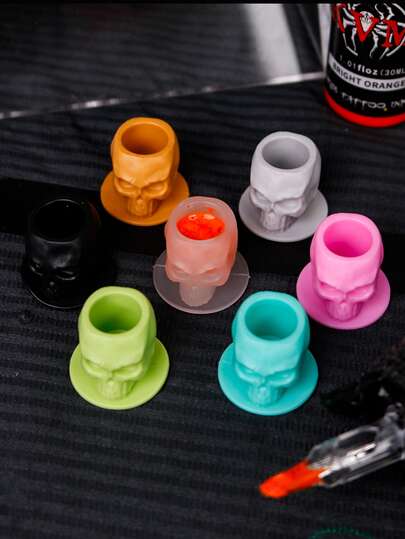 50pcs Skull Tattoo Ink Cups (With Holders), Multiple Colors Available (Clear, Black, Pink, Light Gray, Brown, Olive Green, Lake Blue), Silicone Material, Sturdy Sealed, Disposable, Easy To Clean, Lightweight & Portable, Essential For Tattoo Artists, Tattoo Accessories