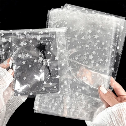 200个透明节日礼品包装袋，高端透明包装袋，DIY小礼品袋，珠宝礼品包装袋，平底防水包装袋，小星星图案礼品袋，适用于节日、生日、婚礼和派对礼品包装。