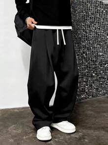 男士宽松休闲纯色阔腿裤，带抽绳腰带和大口袋，适合日常行走、工作、旅行和其他场合。