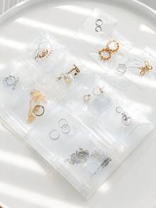 1本哑光透明首饰收纳册，内含30个防氧化收纳袋，适合收纳首饰、小饰品、耳环，是旅行、夏季、开学季的理想之选。 - 無色 - 查看 11