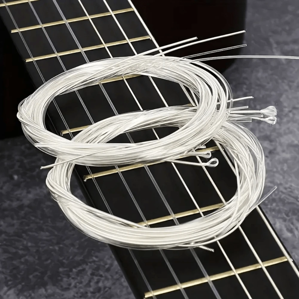 Bộ 6 dây đàn guitar cổ điển bằng nylon màu trắng, giúp tăng cường âm thanh của đàn guitar acoustic! Dây nylon, dành cho đàn guitar acoustic, đóng gói riêng lẻ, phụ kiện đàn guitar, phụ kiện bộ đàn guitar dân gian, bộ phụ kiện đàn guitar dân gian hoàn chỉnh, âm thanh sáng và sống động, cải thiện hiệu suất chơi, phù hợp cho người mới bắt đầu và nhạc sĩ, phụ kiện nhạc cụ, thích hợp để trang trí đàn guitar, quà tặng guitar, quà tặng âm nhạc, đồ dùng phòng nhạc, ban nhạc, sự kiện biểu diễn, quà tặng học sinh, quà tặng nam, quà tặng nữ. - Nhiều màu - Xem 1