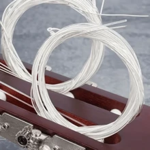 Bộ 6 dây đàn guitar cổ điển bằng nylon màu trắng, giúp tăng cường âm thanh của đàn guitar acoustic! Dây nylon, dành cho đàn guitar acoustic, đóng gói riêng lẻ, phụ kiện đàn guitar, phụ kiện bộ đàn guitar dân gian, bộ phụ kiện đàn guitar dân gian hoàn chỉnh, âm thanh sáng và sống động, cải thiện hiệu suất chơi, phù hợp cho người mới bắt đầu và nhạc sĩ, phụ kiện nhạc cụ, thích hợp để trang trí đàn guitar, quà tặng guitar, quà tặng âm nhạc, đồ dùng phòng nhạc, ban nhạc, sự kiện biểu diễn, quà tặng học sinh, quà tặng nam, quà tặng nữ. - Nhiều màu - Xem 6