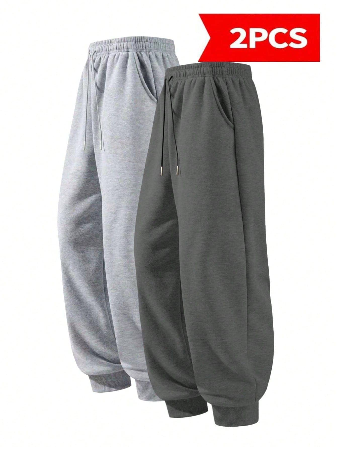 2 chiếc quần jogger nam màu trơn, cạp chun có dây rút, quần ống rộng thoải mái kiểu đường phố có túi. - Nhiều màu - Xem 1