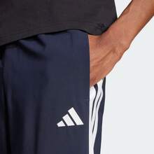 Quần thể thao adidas ESSENTIAL SFW24 kẻ sọc, dáng rộng, unisex, màu xanh mực huyền thoại. - màu đen - Xem 5
