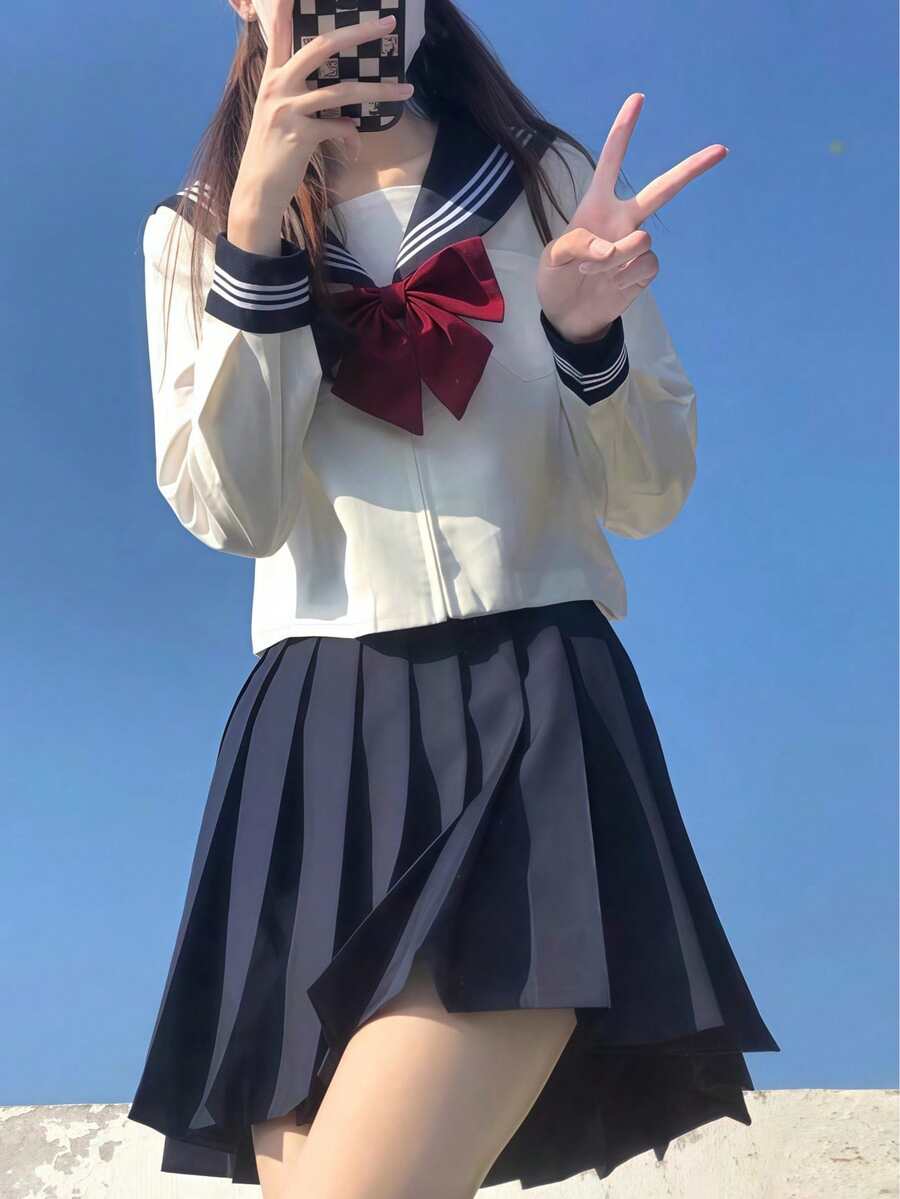 一套可爱风JK学生制服套装,含领带,藏蓝色百褶裙和白色长袖衬衫,适合派对、角色扮演、Cosplay、毕业照、约会等场合。 - 彩色 - 查看 1