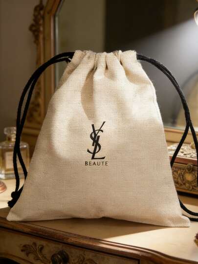 Yves Saint Laurent 白色多功能抽绳化妆包，实用收纳袋，可存放化妆品、戒指、配饰及日常用品