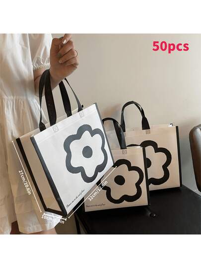 50个无纺布花卉图案礼品手提袋，高端服装包装袋，可重复使用，适用于派对、度假、家居收纳和购物等场合。