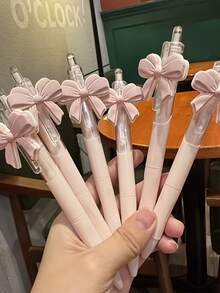 6支可爱粉色蝴蝶结中性笔 | 少女风文具，0.5毫米顺滑可伸缩圆珠笔，青少年学生办公用品及礼物，塑料材质