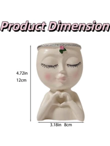 这款熔模人脸造型花盆造型独特，适合室内植物，是一款可爱的小型多肉植物花盆，底部有排水孔，是馈赠佳品（白色）。