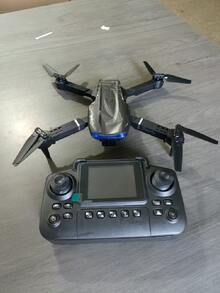 CASRRA Drone E99 actualizado con cámara y pantalla de control remoto, cámara dual 720P, motor sin escobillas, retención de altitud, control por gestos, sensor de gravedad, Body plegable, disparo automático, apto para uso en interiores y exteriores, juguete de dron asequible para adultos, excelente regalo de cumpleaños y festividades, incluye batería de 1800mAh - E99 Negro - Ver 9