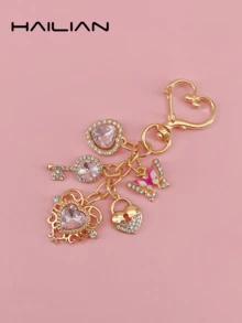 HAILIAN 这款闪亮合金包饰套装镶嵌有各种钻石、闪亮的心形、花朵和蝴蝶图案。它可以用作包饰、钥匙扣，也是送给家人、朋友或爱人的绝佳生日、节日或开学礼物。 - 粉色 - 查看 3