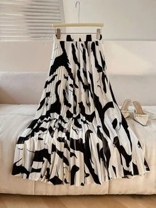 女士黑白百褶裙，全身印花，优雅百搭，适合海滩、度假、日常穿着，四季皆宜。 - 黑與白 - 查看 1