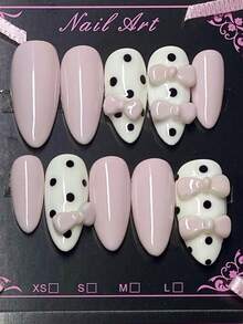 Valentine's Day Pink And White 10 Piece Medium To Long Almond Shaped Press On Nail Set, Featuring Gentle Black And White Polka Dots And Sweet Pink Bow Decorations For A Cute And Sweet Wearing Style. It Is A Fully Detachable Fake Nail Set, Suitable For Office Workers, Students, Party Girls, And Beauty Products Of All Seasons. It Comes With 1 Jelly Gel And 1 Nail File. - Baby Pink - View 1