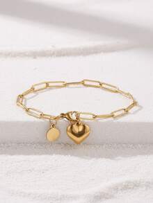 这款两件套项链和手链的长度和周长适合大多数人佩戴，设计时尚浪漫，采用不锈钢材质。这套首饰独特甜美，整体造型呈链状。细节之处在于项链和手链均由链条连接，并搭配心形和圆形吊坠的女士项链套装。 - 項鍊+手鍊 - 查看 4