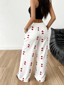 Quần ống rộng in hình trái tim trắng, quần thể thao thoải mái, cạp chun có dây rút, thích hợp cho ngày Valentine. - Đỏ - Xem 5