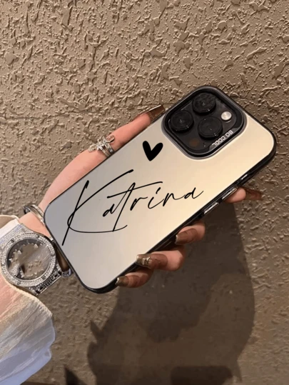 A Custom Glitter Silver Phone Case, Available In Black And White, With Personalized Name And Heart Stickers. Drop-Proof And Crash-Resistant, Full Of Love, The Perfect Valentine's Day Gift. Stylish, Simple, And Creative, Compatible With IPhone, Galaxy, Oppo, Honor, Infinix. A Holiday Gift For Friends, Family, Or Loved Ones.