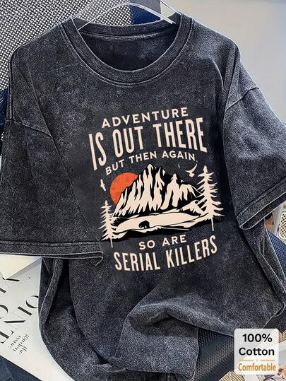 女士宽松复古黑色长袖T恤，休闲卡通印花，柔软舒适，适合春夏穿着。