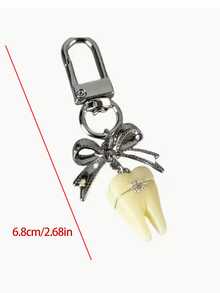 1个牙齿造型钥匙扣，可爱蝴蝶结包包挂饰，时尚钱包挂件钥匙圈，复古独特，多功能包包/手机挂饰/钥匙扣，塑料金属材质，牙科主题包包挂饰，牙医主题配饰礼品