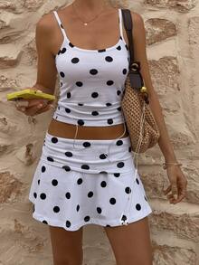 Bộ đồ đi biển dành cho nữ, gồm áo hai dây in chấm bi và chân váy midi xếp ly eo. - trắng - Xem 1