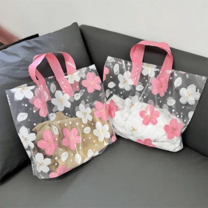 50pcs Transparent High-Quality Clothing Packaging Bags, Ladies Shopping Bags, Pink Floral Pattern Packaging Bags, Reusable Tote Bags, Thick Waterproof Portable Large Capacity Handbags, Suitable For Holidays, New Year, Weddings, Parties, Shopping, Birthday Gifts, Party Favors And More