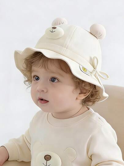 1顶女婴渔夫帽，可爱又讨喜的婴儿遮阳帽，适合春夏穿着，轻便透气，适合户外活动，适合6-24个月的宝宝。