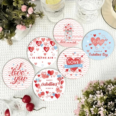 A Set Of Valentine's Day Themed Coasters With Heart, Arrow, And Glass Bottle Decorations - The Classic Valentine's Elements. Accompanied By Romantic Text Like "LOVE", "I Love You", And "HAPPY Valentine's Day", In A Sweet And Hand-Drawn Cartoon Style With A Pink And Blue Color Scheme To Convey The Loving Atmosphere Of Valentine's Day.