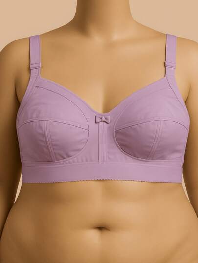 Sutiã plus size de tecido plano com detalhe de laço e elasticidade média, ideal para uso diário.