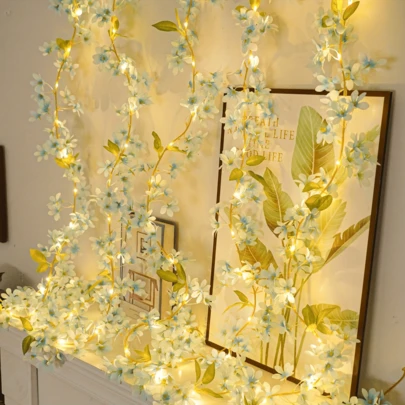 1串20LED蓝色春日花仙子串灯，浪漫悬挂式人造花藤灯，电池供电（不含电池），绿叶藤蔓，适用于家居、卧室、花园、婚礼、母亲节、派对、情人节装饰