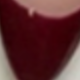 عنابي اللون
