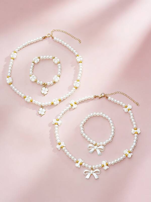 Set de 2 piezas de pulsera y collar con perla, lazo y trébol para niñas