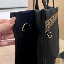 Versace Multifunctional Tote Makeup Bag - One-Piece Nylon Black Tote Bag With Gold Greek Key Pattern, Featuring An Adjustable Crossbody Strap. A Luxury Designer Everyday Work And Makeup Bag. - Black - View 5