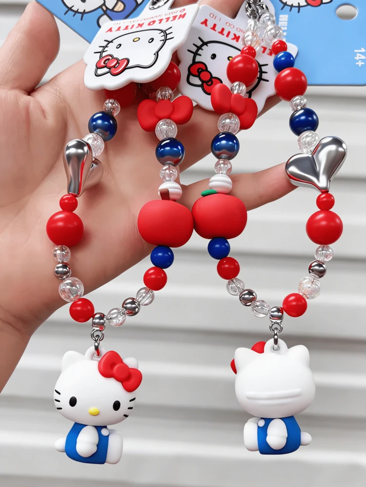 ビーズチェーンバッグペンダント＆キーチェーン、カラフルなハートアップルビーズアクセント、シルバーハートチャーム、ブルードレス＆レッドリボンデザイン、丈夫なメタルキーリング、コンパクトな高さ16cm、滑らかで快適な手触り、鮮やかでかわいい柄、バッグ＆キーアクセサリー、デスクデコレーション、ファンやティーン向けのコレクターアイテム、誕生日やホリデーギフトに最適。 - ハローキティ - 見る 8