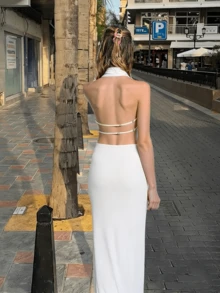 Bộ đồ 2 món gợi cảm gồm áo crop top hở lưng và chân váy ôm sát màu trắng, thích hợp cho mùa hè. - trắng - Xem 6