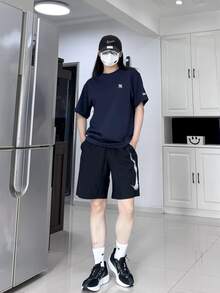 Nike Dri-Fit Dri-FIT純色腰部抽繩速乾休閒短褲 男款黑色 - 黑色 - 查看 5