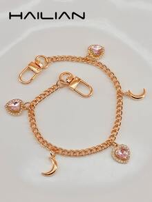 HAILIAN Esta correa de bolso de aleación está adornada con corazones de rhinestone de colores y colgantes encantadores, que incluyen una luna brillante, una cereza cristalina, una mariposa de color degradado y gotas de lluvia neón vibrantes. Se puede usar como correa de bolso, accesorio de bolso o cadena de extensión para su bolso. Por supuesto, también es un pequeño regalo de estilo para familiares, amigos o seres queridos durante las vacaciones. - Rosa - Ver 4