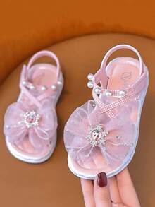 Sandal hở mũi đính nơ đá lấp lánh dễ thương cho bé gái, giày đi biển thoáng khí. - Màu Hồng baby - Xem 2