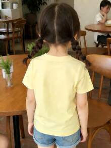 This Disney Castle And Minnie Mouse Print Crewneck T-Shirt Is Perfect For Boys And Girls To Wear To Holiday Parties, Family Gatherings, Outdoor Activities, Travel, And As A Gift For Children Visiting Disneyland. - Apricot - View 2