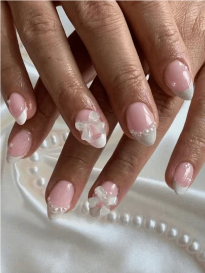 24pcs Short Oval Nail Stickers, White French Tip Stickers, Transparent Bow & Faux Pearl Decor, Perfect For Short Fake Nails Set, Includes: 1pc Jelly Gel And 1pc Nail File. Heart-Shaped Nails Suitable For Women & Girls For Daily Wear And Valentine's Day Parties. Nail Supplies