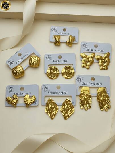 7 Pairs Of Elegant And Luxurious Golden Women's Earrings - 18K Gold Plated, Made Of Stainless Steel, Hypoallergenic. Simple And Mosaic-Free Design, Double Bow Style, Heart-Shaped, Romantic. Round Uneven Design. Perfect For Daily And Festive Wear. Hearts Valentines Jewelry