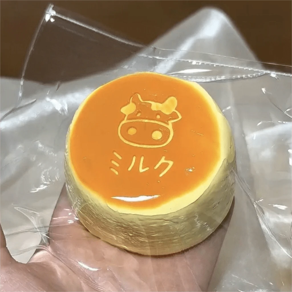 Squishy Aesthetic Handmade Silicone Roasted Milk Pudding Squishy Toy, Cute Cartoon Cow Miruku Print Slow Rebound Moldable Squeeze Decompression Toy, Ultra Soft Stress Release Desktop Ornament, Lovely Birthday Christmas Party Favor Gift - Multicolor - View 1